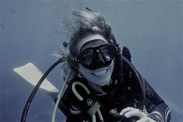 Smiling scuba diver